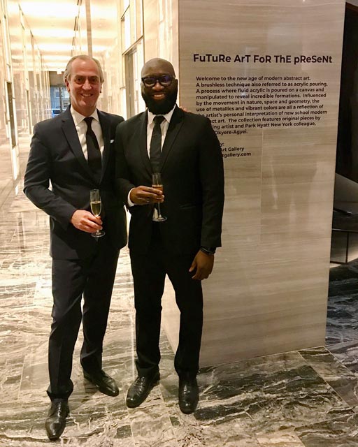 Jeffrey Okyere Agyei with PHNY GM Peter Roth